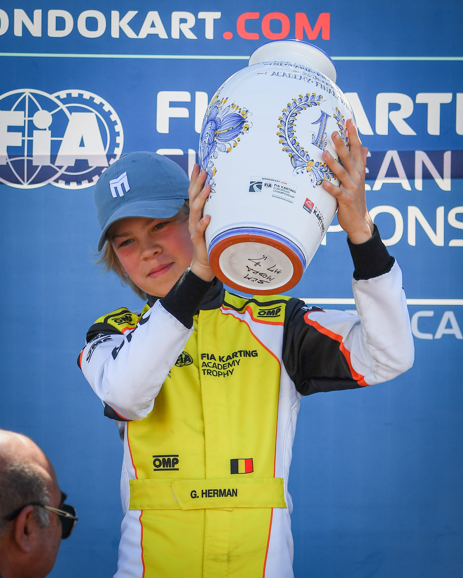 Gilles lifting the FIA Karting Academy Trophy