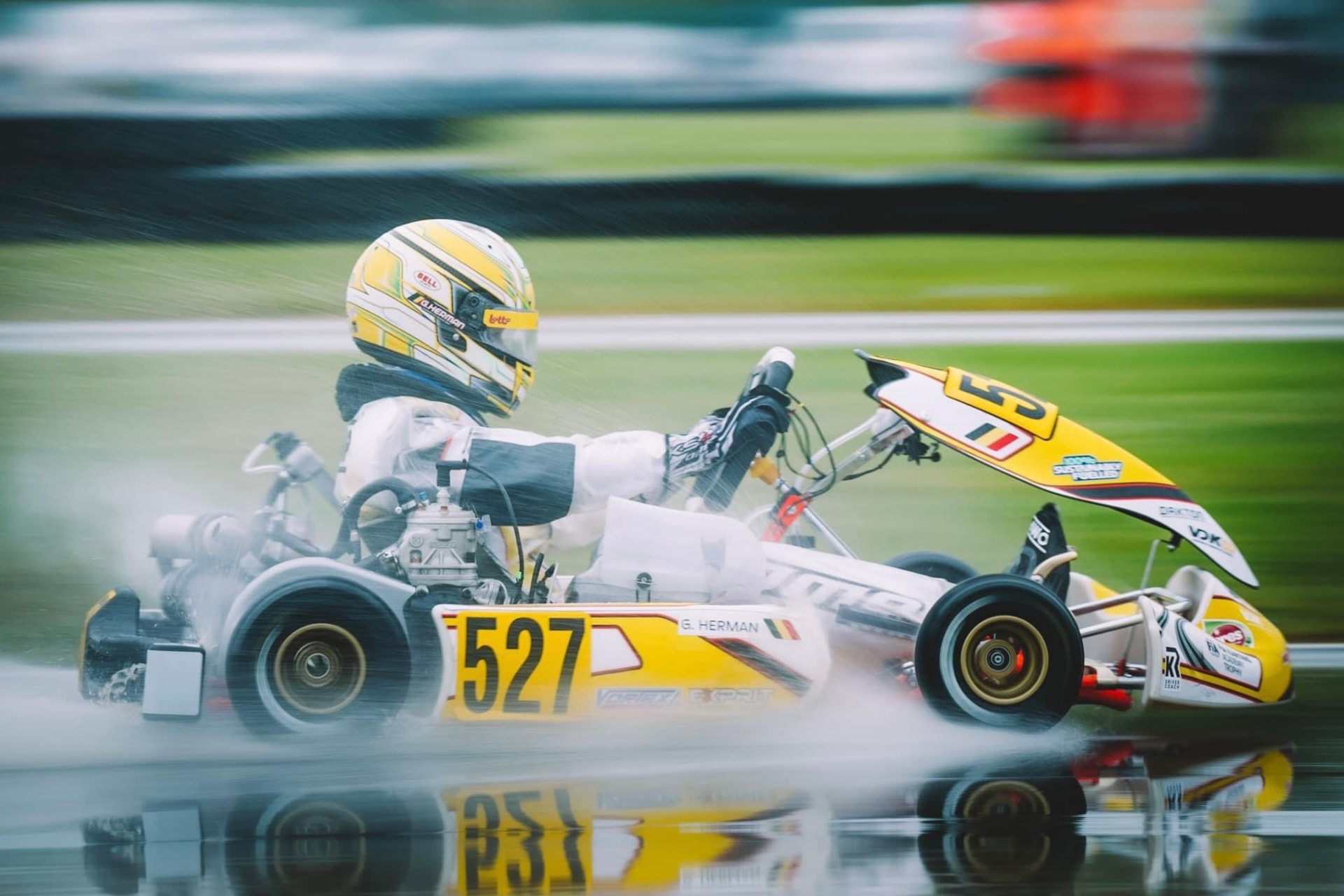 Academy kart 527 at speed on a soaked track